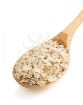 oat flakes in spoon isolated on white background