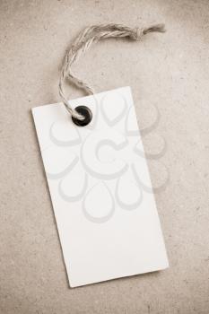 price tag label at paper textured background