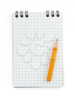 pencil on checked notebook isolated on white background