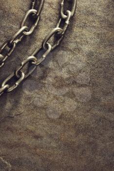 metal chain at stone background