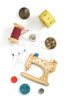 sewing tools and accessories isolated on white background