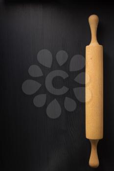 rolling pin on wooden background