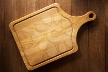cutting board on wooden background