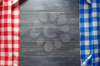 cloth napkin checked on wooden background