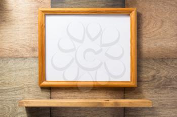 photo picture frame at wooden background