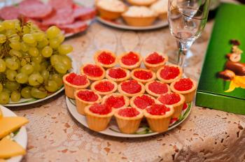 Red caviar.
Example of celebratory registration of tables, tasty delicacy.
