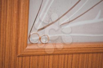 Wedding rings in an interior.