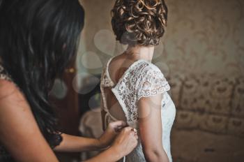 Process of setting of a wedding dress.