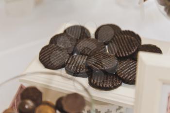 Chocolate biscuit medallions.