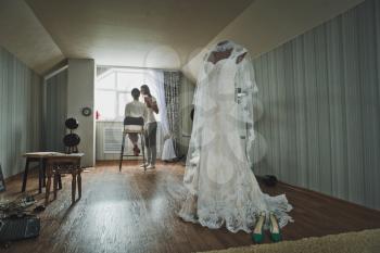 White wedding dress in the room.