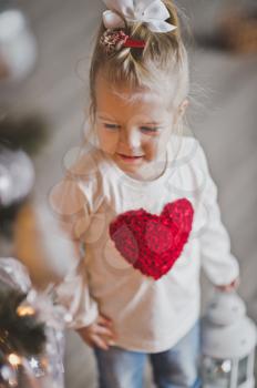 Child with heart on chest.