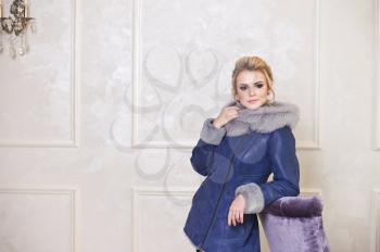 Advertising photography for sale fur coats and sheepskin coats.