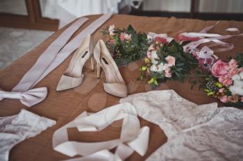 Clothing and jewelry of the bride before the ceremony.