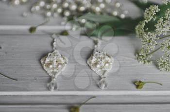Beautiful female earrings with beads.