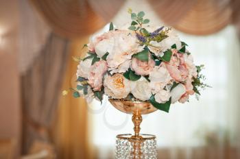 Table decoration with flower bouquets.