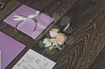 Wedding dress details and invitations.