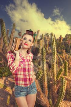 pin-up girl in cacti. retro style. cacti growing in a picturesque park near the sea