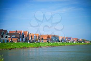 fishing village of Volendam in Holland in the summer by the sea.