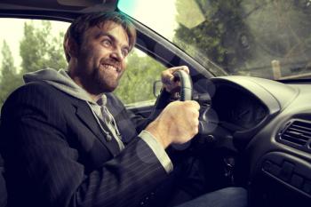 humor man driving a car
