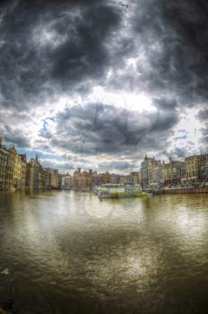 Amsterdam and its canals where boats sail home