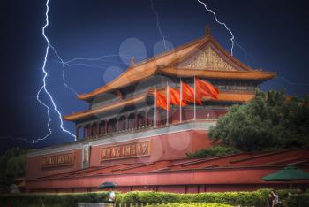Tiananmen Square is located in the center of Beijing, the capital of the People's Republic of China. Bright flashes of lightning during a thunderstorm.