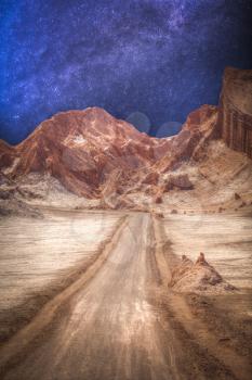Lunar Valley in the Atacama Desert, Chile. Astrophotography. Night sky with stars.