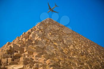 tourist plane flies over the pyramids of Cairo Egypt