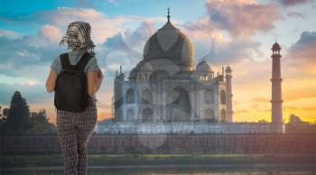 girl tourist travels through Agra. Taj Mahal. India.