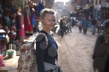 woman travels on the street of the city of Kathmandu
