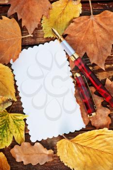 autumn leaves on a table, autumn background