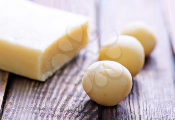 balls from marzipan, marzipan on a table
