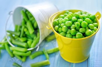 green peas and bean on a table