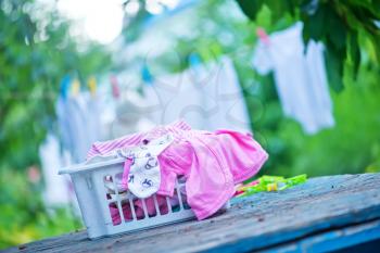 baby Clothes hanging on line in garden