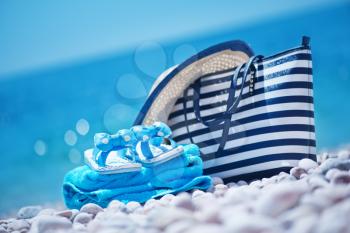 summer background, blue towel on sea beach
