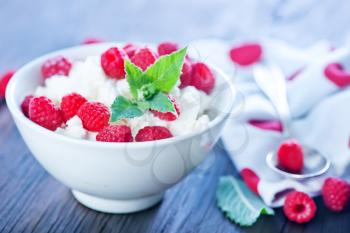 fresh cottage with raspberry in the bowl