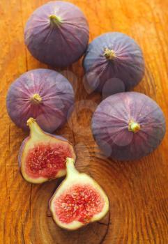 The fig on the wooden board, fresh fig