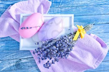 violet soap and lavender on the wooden table