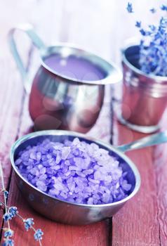 violet sea salt in metal bowl and on a table
