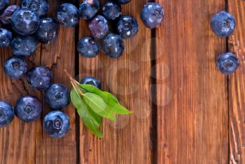  blueberry on the wooden table, fresh blueberry