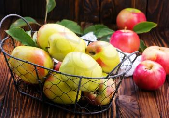  apples on a table, crop of apples