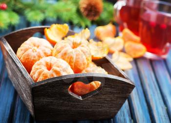 fresh mandarins on a table, christmas background