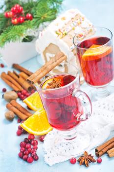 christmas drink with fruits and aroma spice