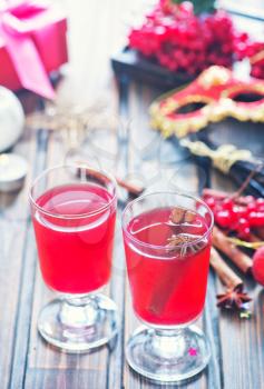 christmas drink with berries and on a table