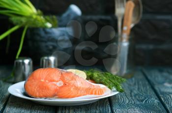 fresh salmon with spice on a table