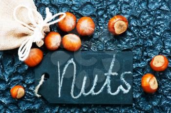 hazelnuts on the black board, dry nuts