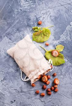 hazelnuts in bag and on a table