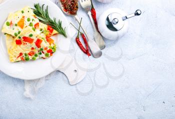 omelette with vegetables, breakfast on a table, stock photo