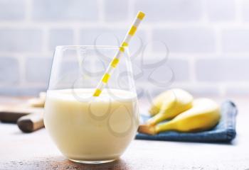 banana smoothie in glass, smoothie from fresh banana