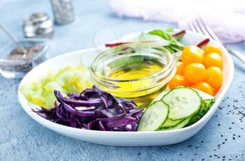 diet food, fresh vegetables and oil, ingredients for salad