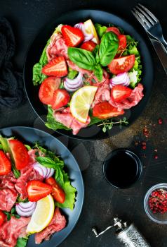 salad with fresh strawberry carpaccio vegetables, stock photo